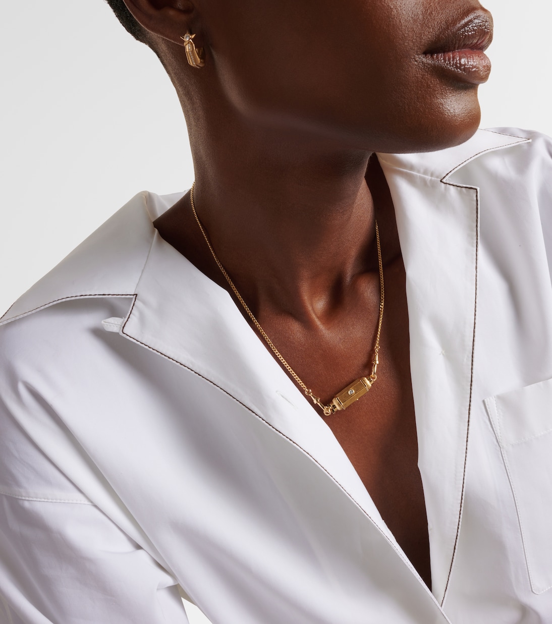 Collana con medaglione Coco in oro 18kt e diamanti, design esclusivo per giovani