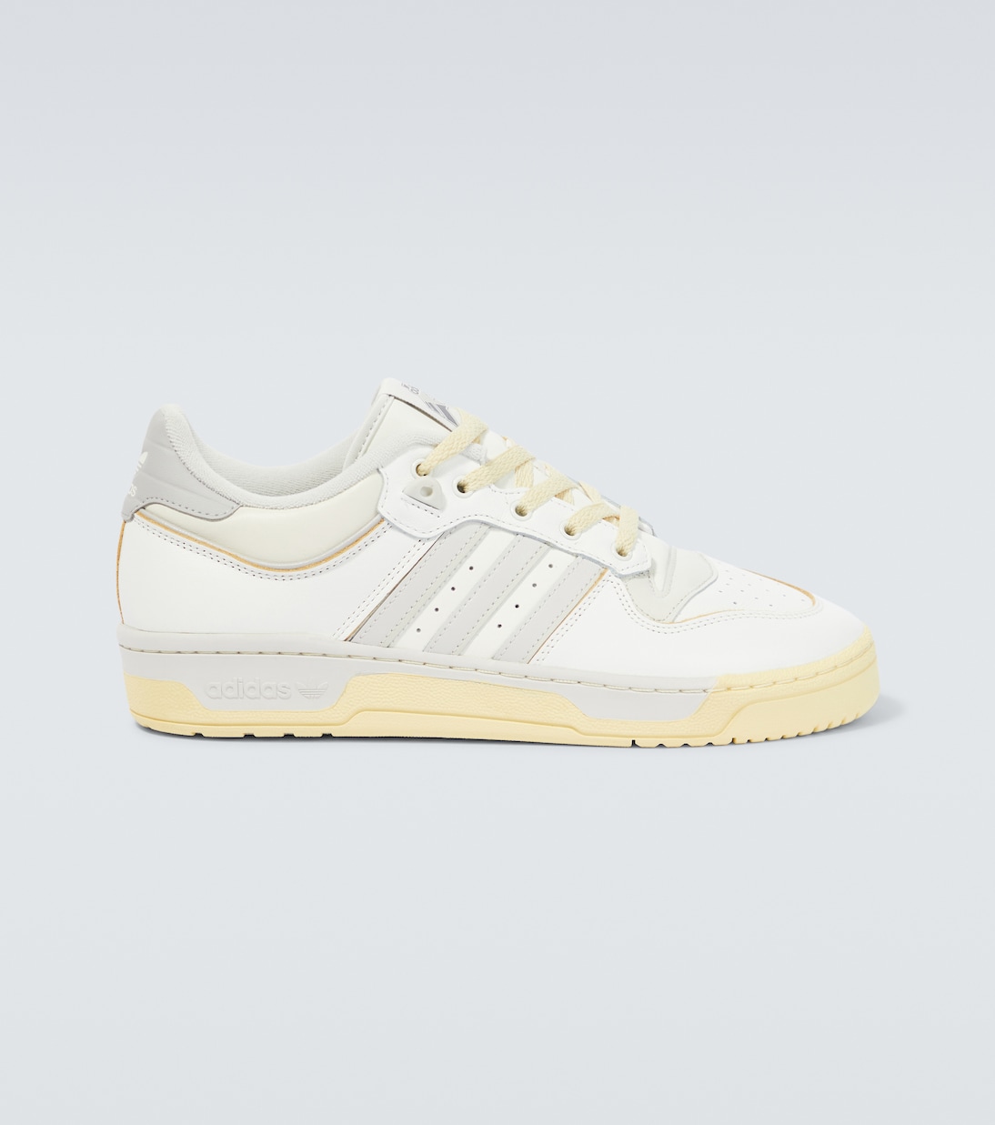 Adidas rivalry low yellow hotsell