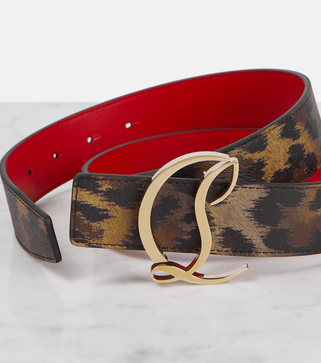 Cintura in pelle con stampa animalier firmata CL, ideale per giovani trendsetter