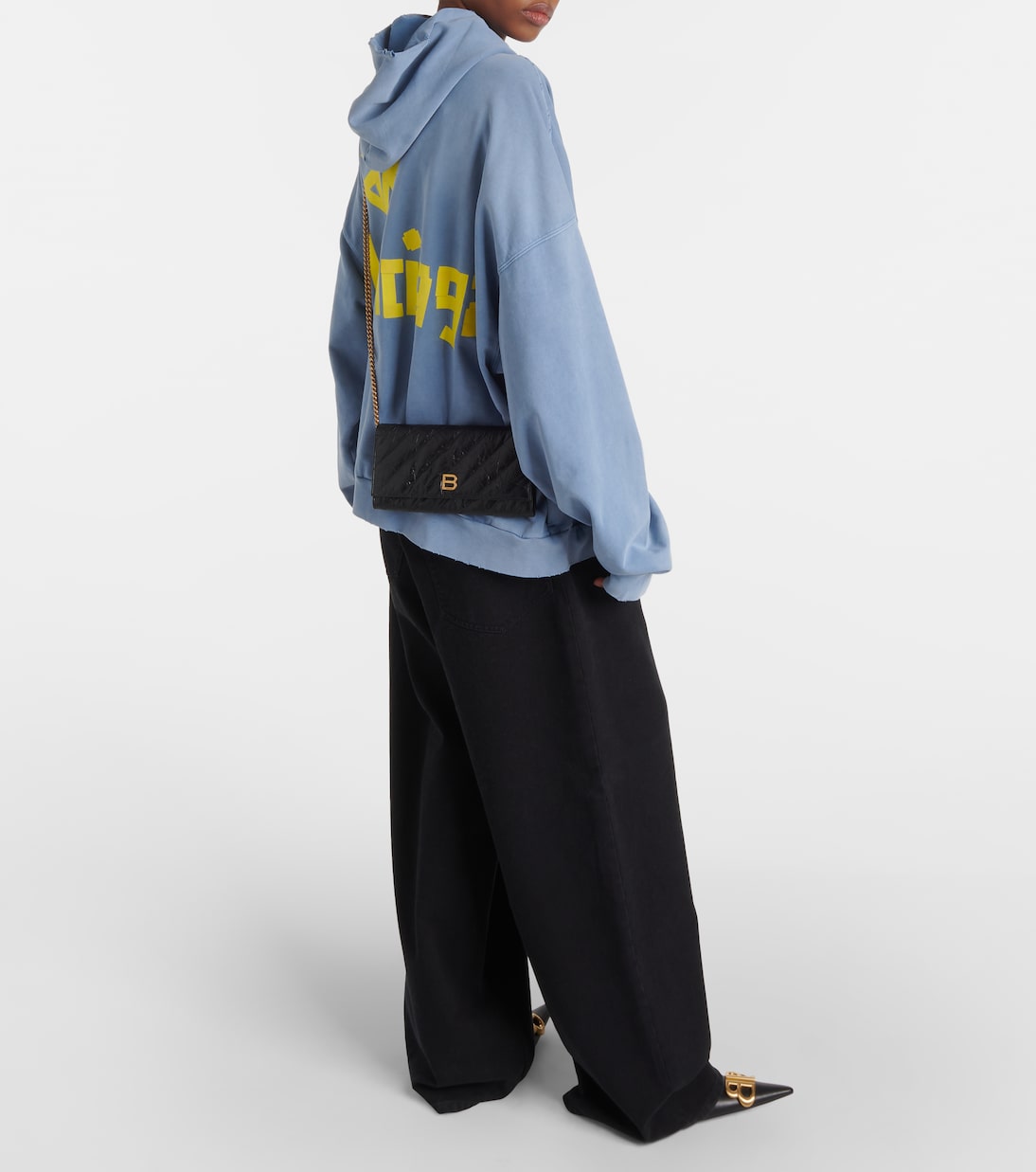 BALENCIAGA Portafoglio in pelle trapuntata con catena, ideale per giovani