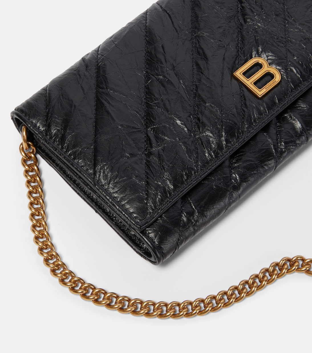 BALENCIAGA Portafoglio in pelle trapuntata con catena, ideale per giovani