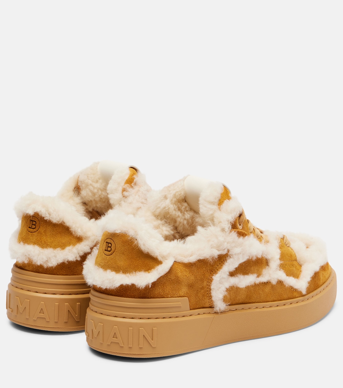 Shearling-trimmed suede sneakers | Balmain