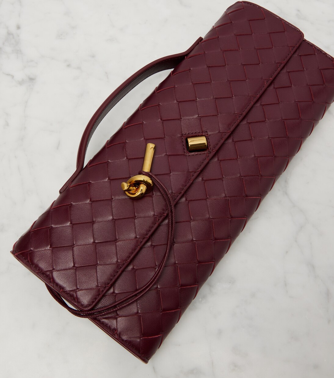 Andiamo Intrecciato leather clutch | Bottega Veneta