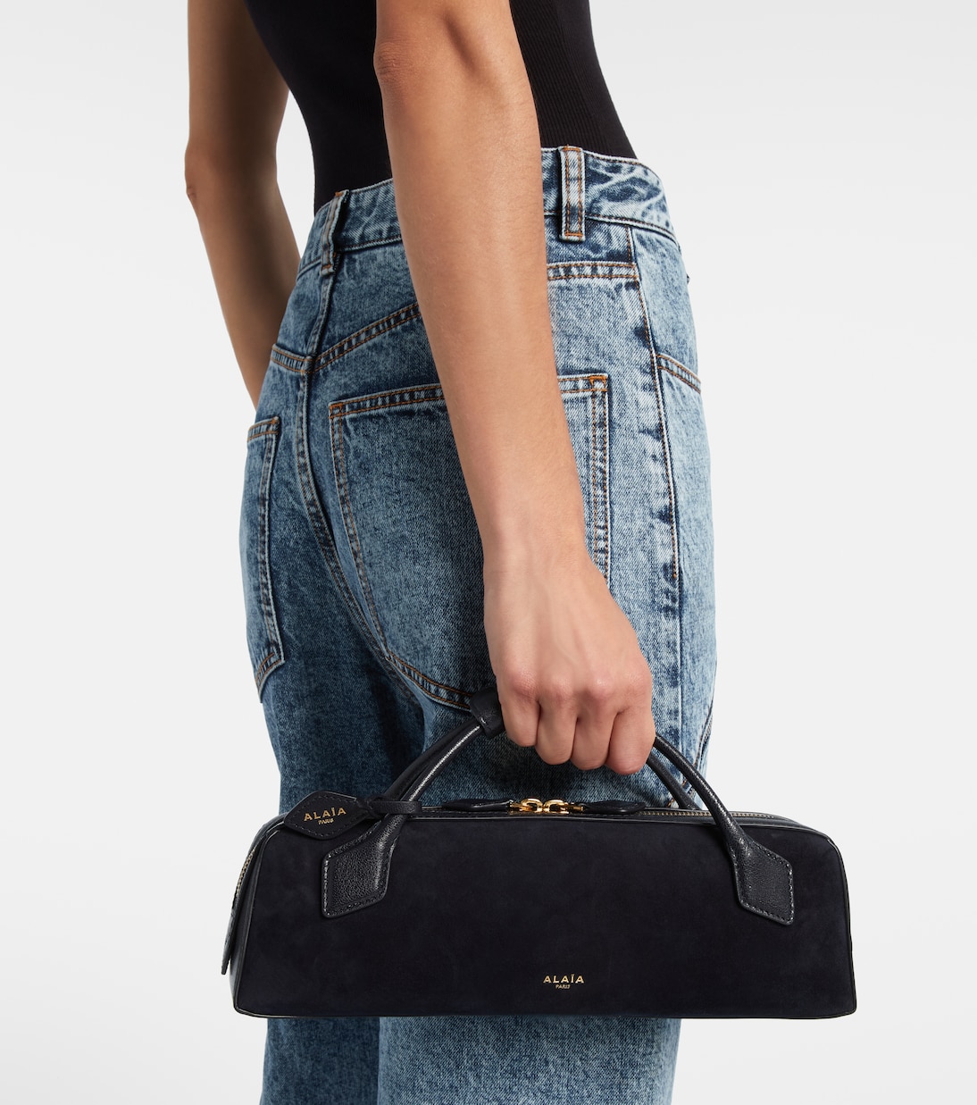 Le Teckel Small calf hair clutch | Alaïa