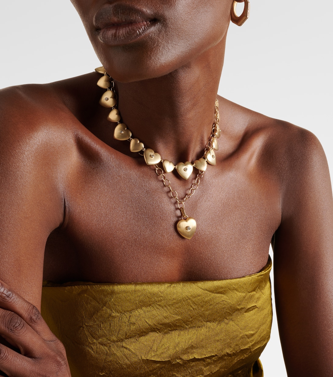 Collana con pendente a cuore MARIE LICHTENBERG in oro 18kt e 14kt, impreziosita da diamanti, perfetta per un look giovane e raffinato.