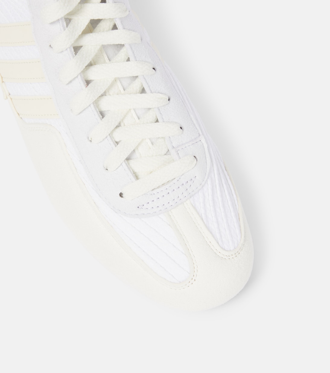 Scarpe alte con frange Rasant V3 di ADIDAS x Stella McCartney per stile giovane e trendy