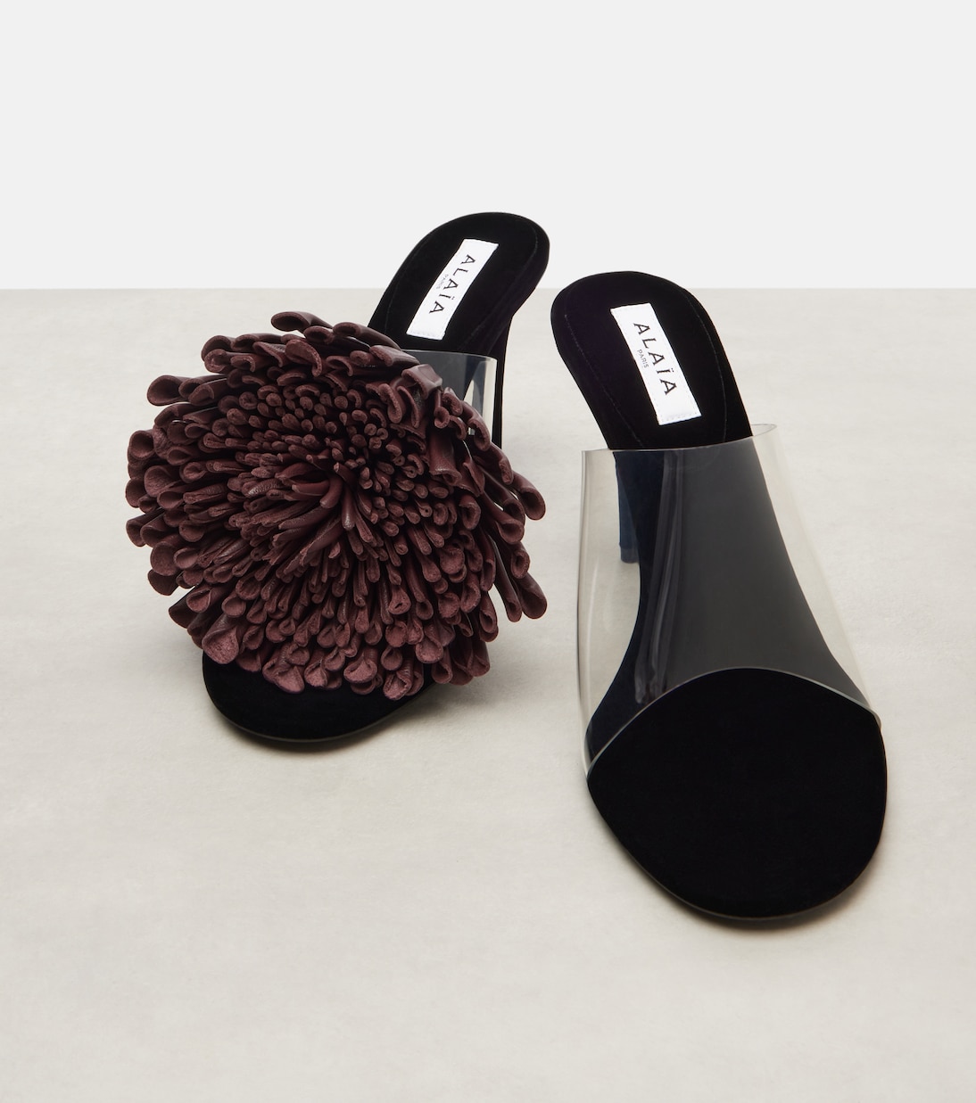 Dahlia 90 asymmetric floral-appliqué mules | Alaïa