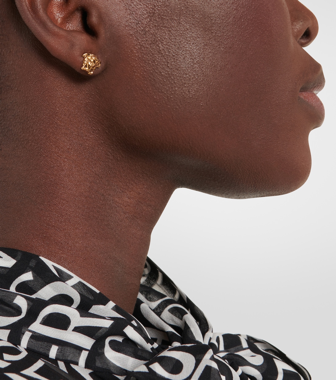 Medusa stud earrings in gold Versace Mytheresa