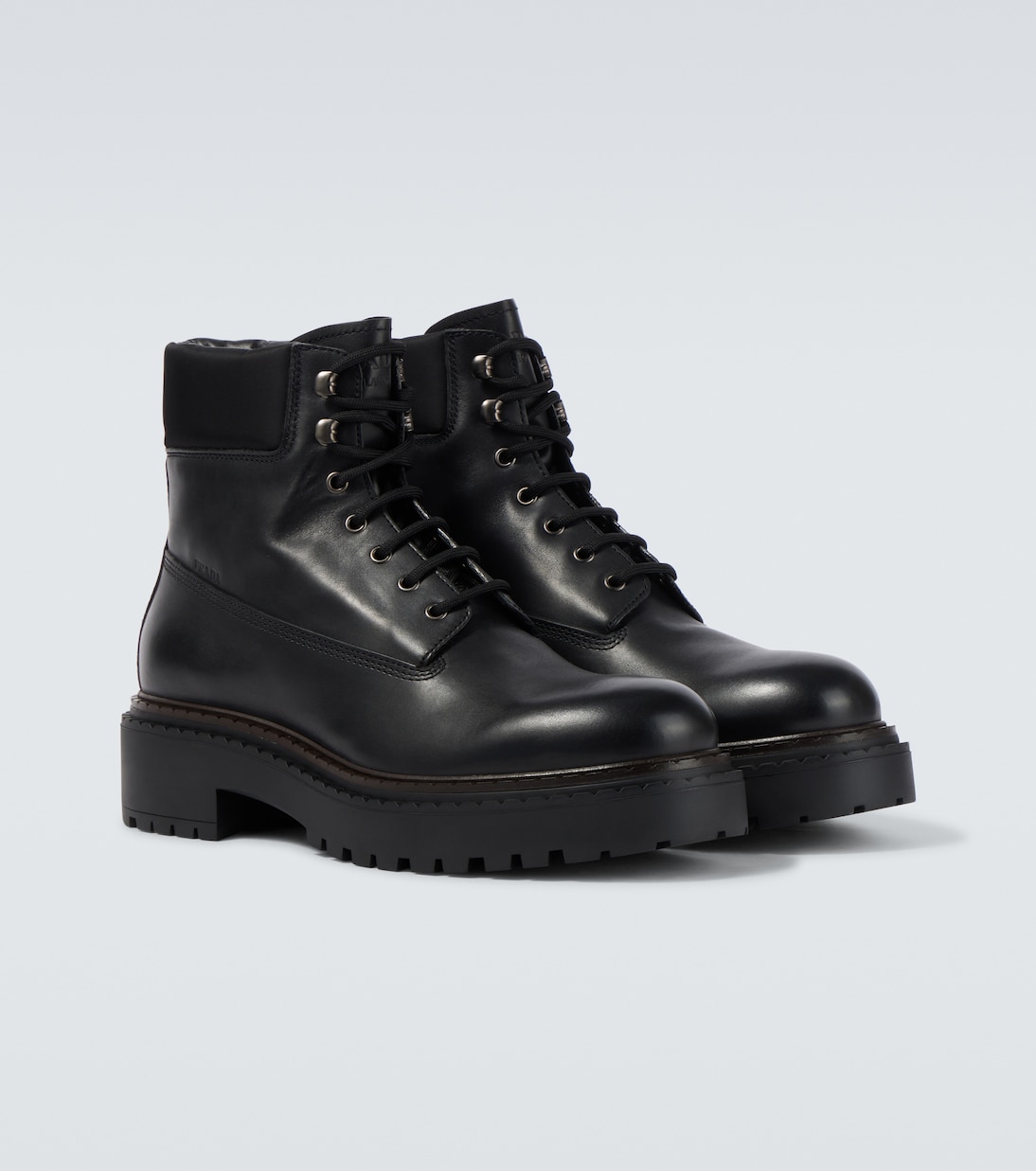 Schnürstiefel aus Leder und Re-Nylon | Prada