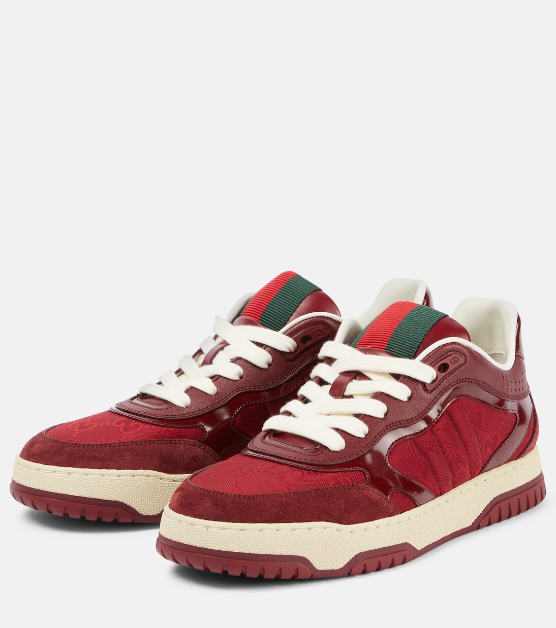 Scarpe da ginnastica GUCCI con dettagli in pelle scamosciata e design a strisce moderne