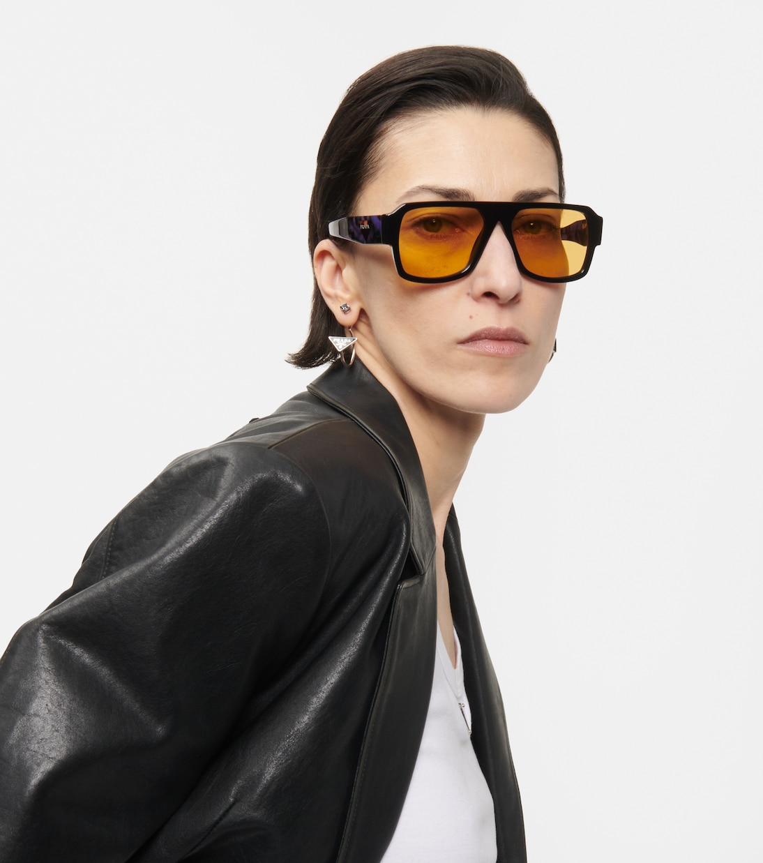 Occhiali da sole PRADA stile aviatore con montatura piatta per giovani alla moda