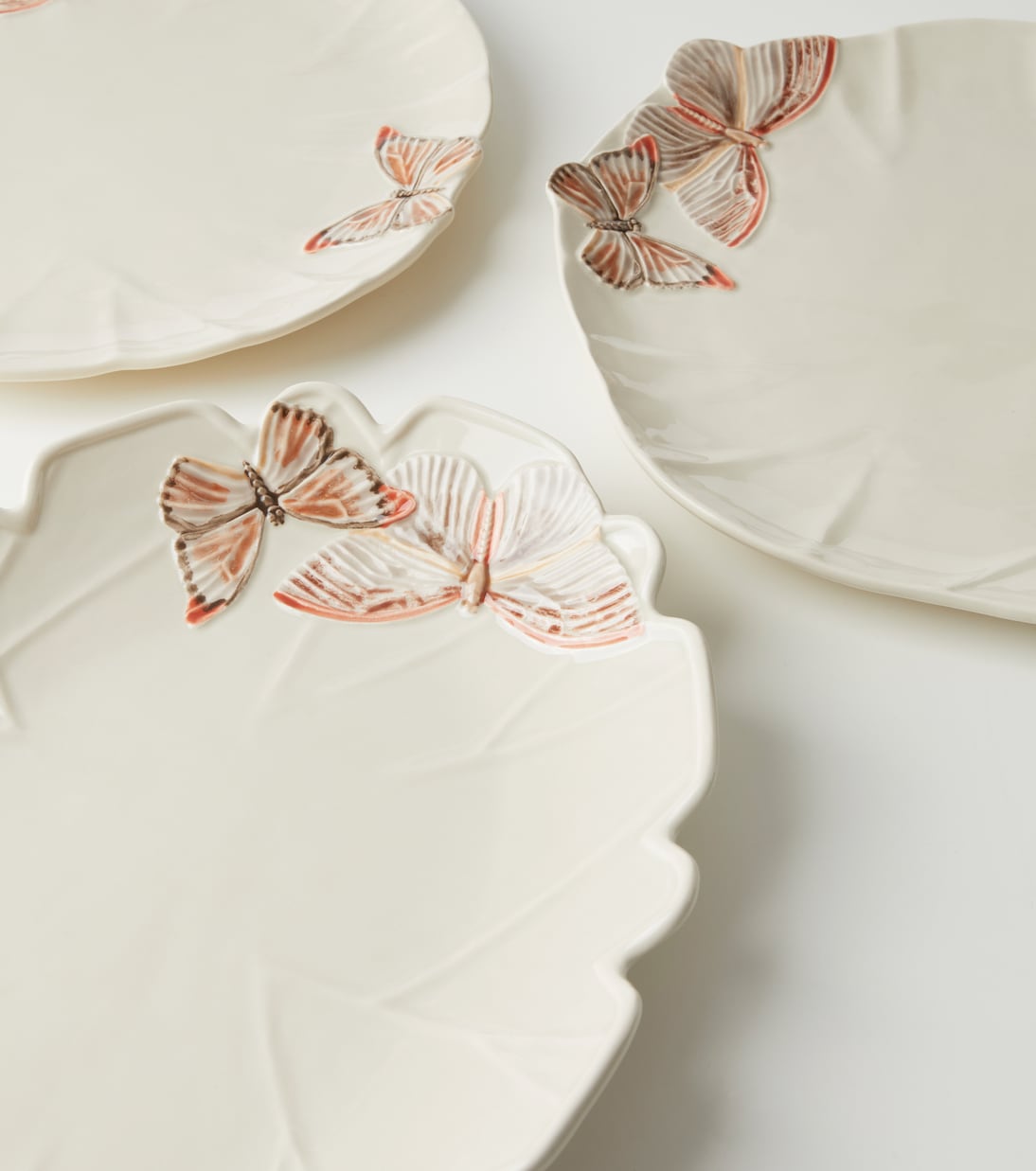 Cloudy Butterflies set of 2 charger plates by Claudia Schiffer | Bordallo Pinheiro
