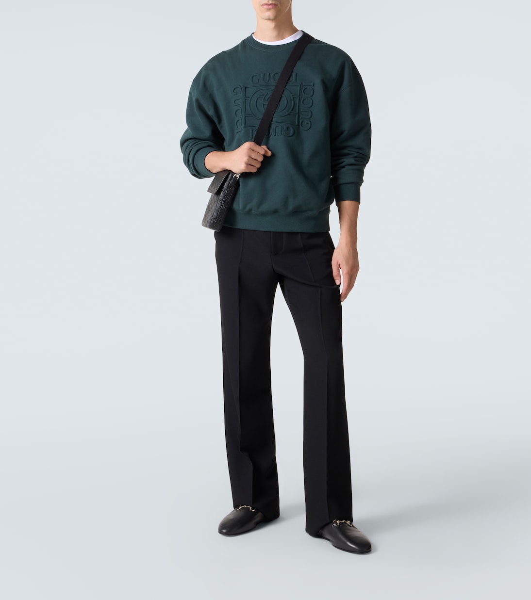 Bolso para móvil GG Emblem de piel grabada | Gucci