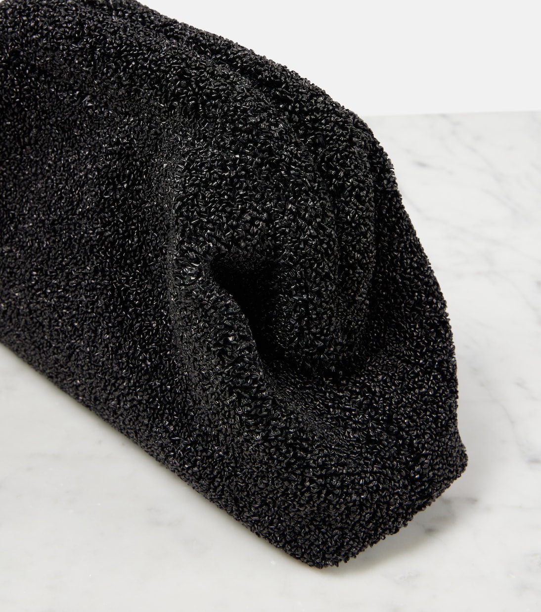 Mira raffia-effect clutch | The Row