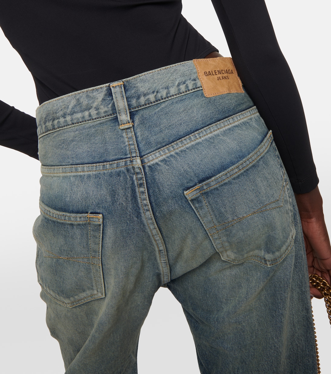 Mid rise flared jeans in blue Balenciaga Mytheresa