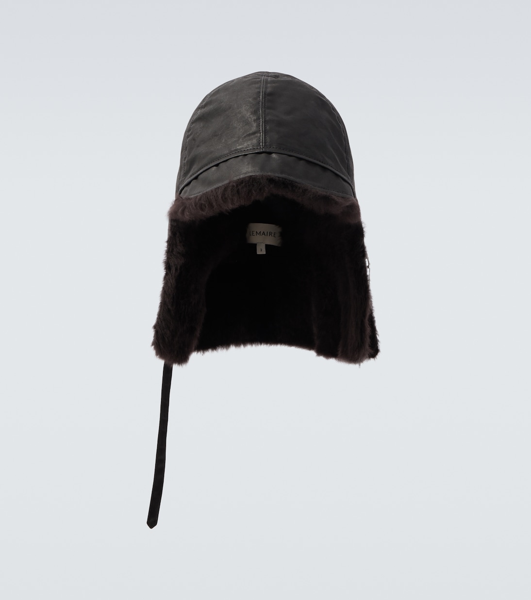 Coated reversible cotton canvas and shearling hat | Lemaire