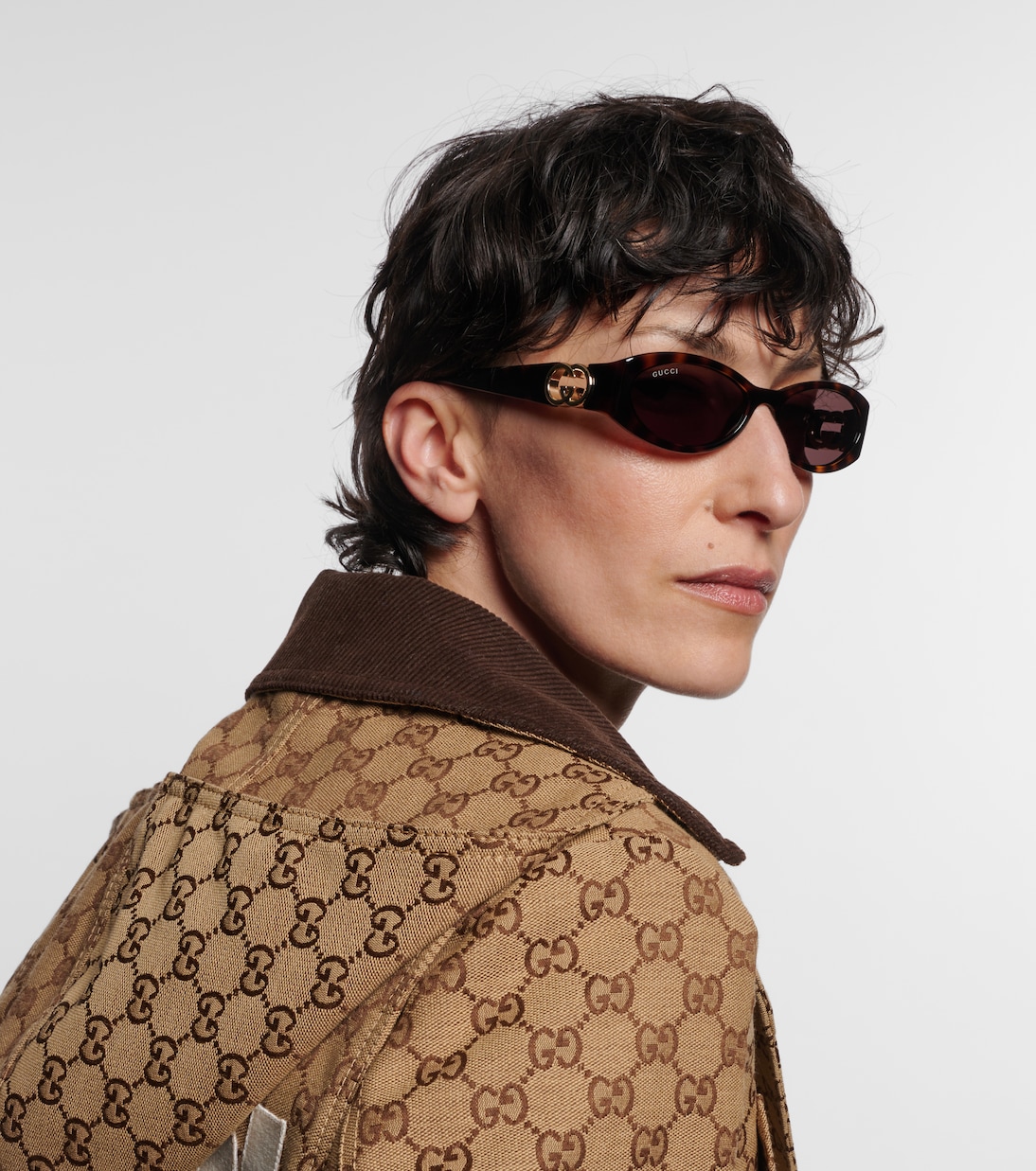 Occhiali da sole Interlocking G ovali | Gucci