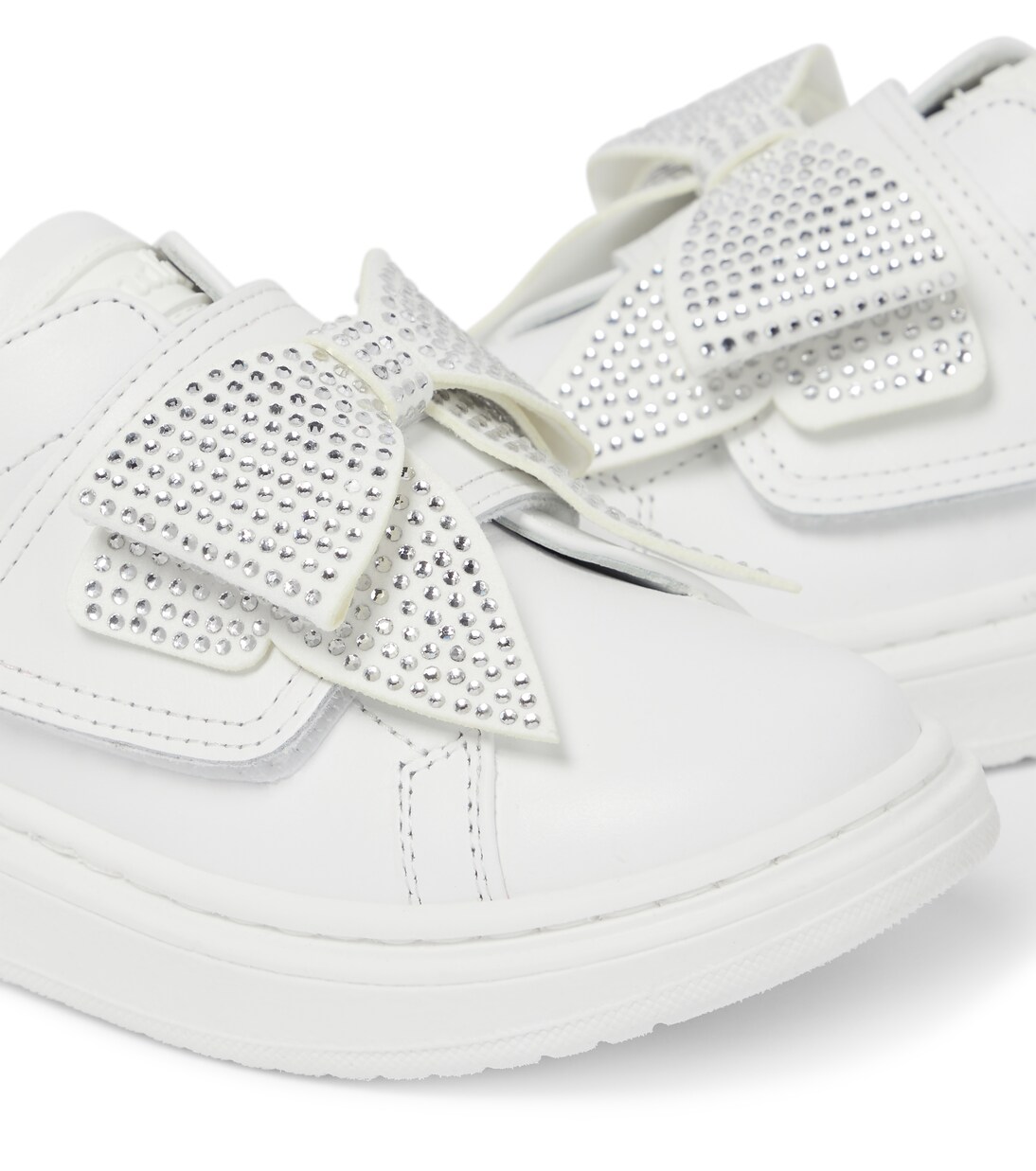 Sneakers in pelle con fiocco | Monnalisa