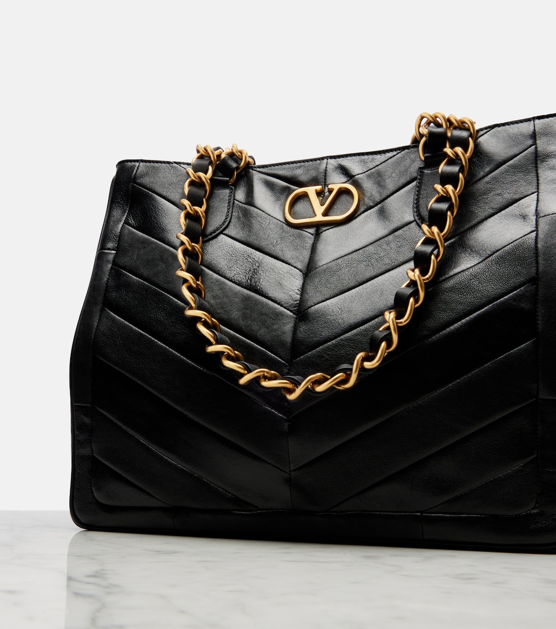 Laseine Small chevron leather tote bag | Valentino Garavani