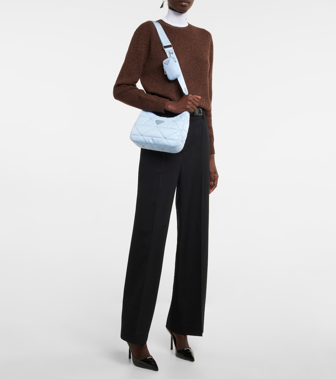 Quilted shoulder bag in blue Prada Mytheresa