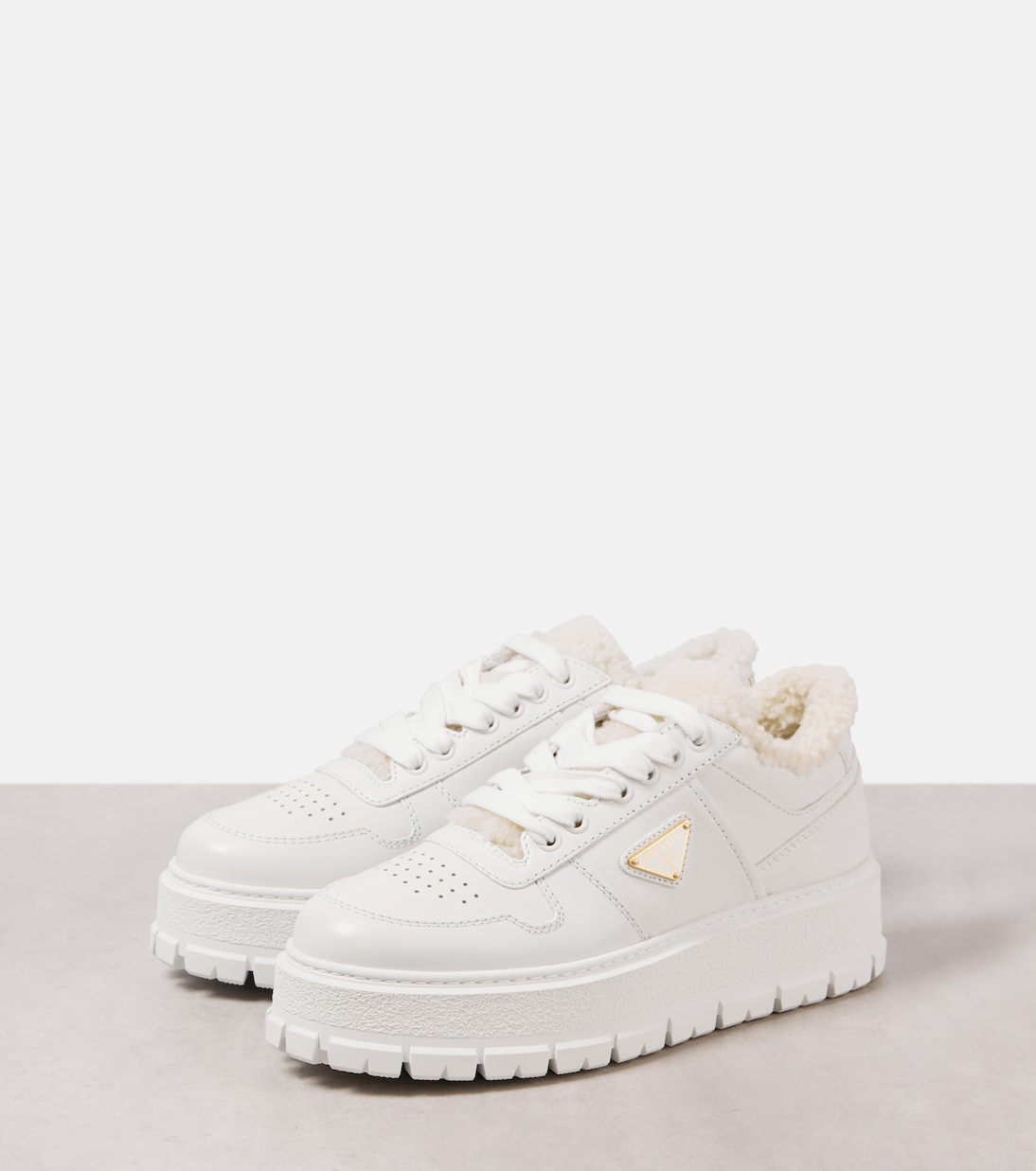Shearling-lined platform leather sneakers | Prada