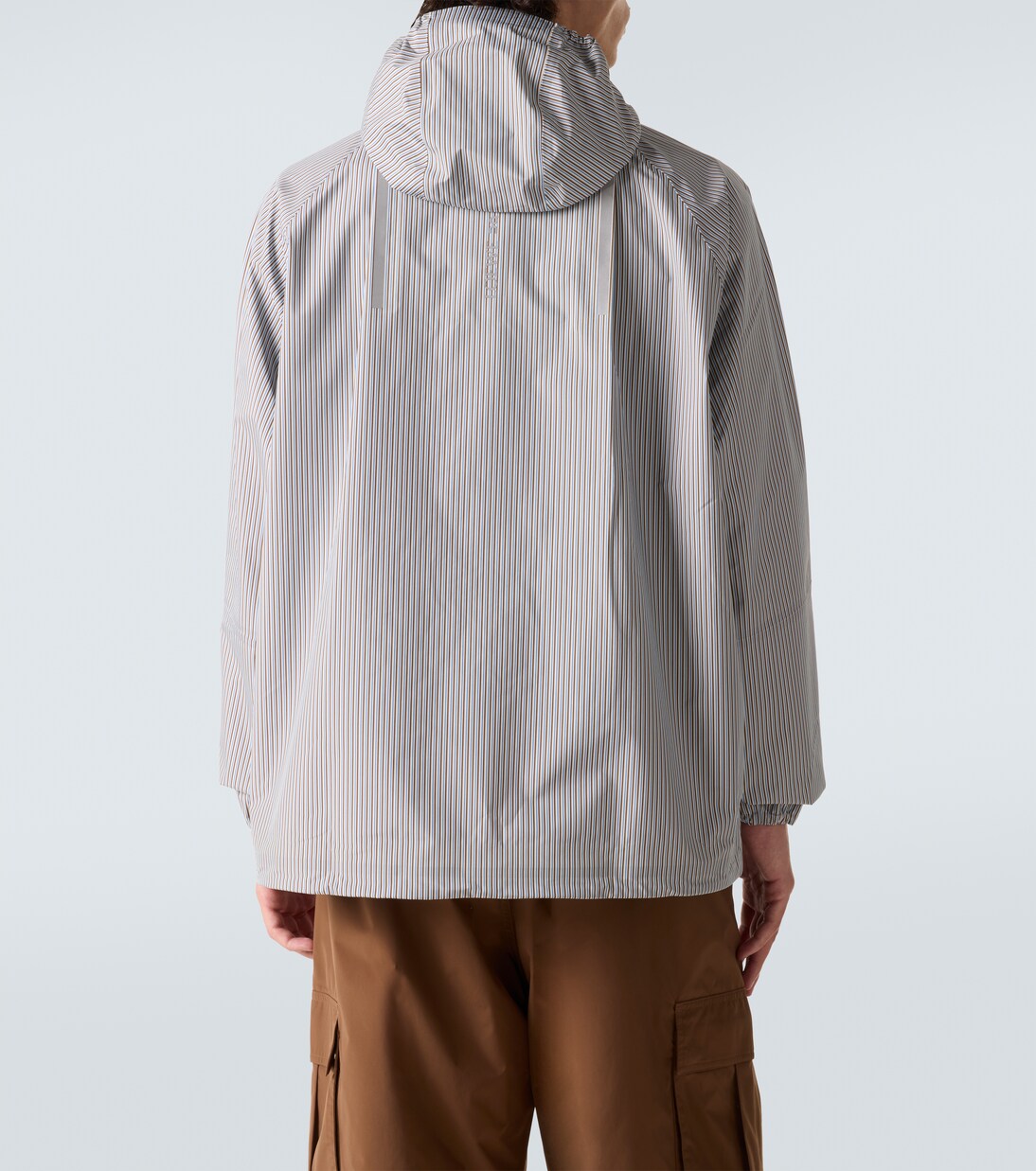 x On striped technical jacket  | Loewe