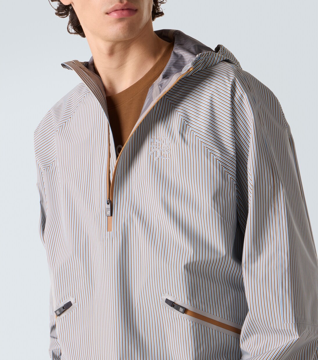x On striped technical jacket  | Loewe