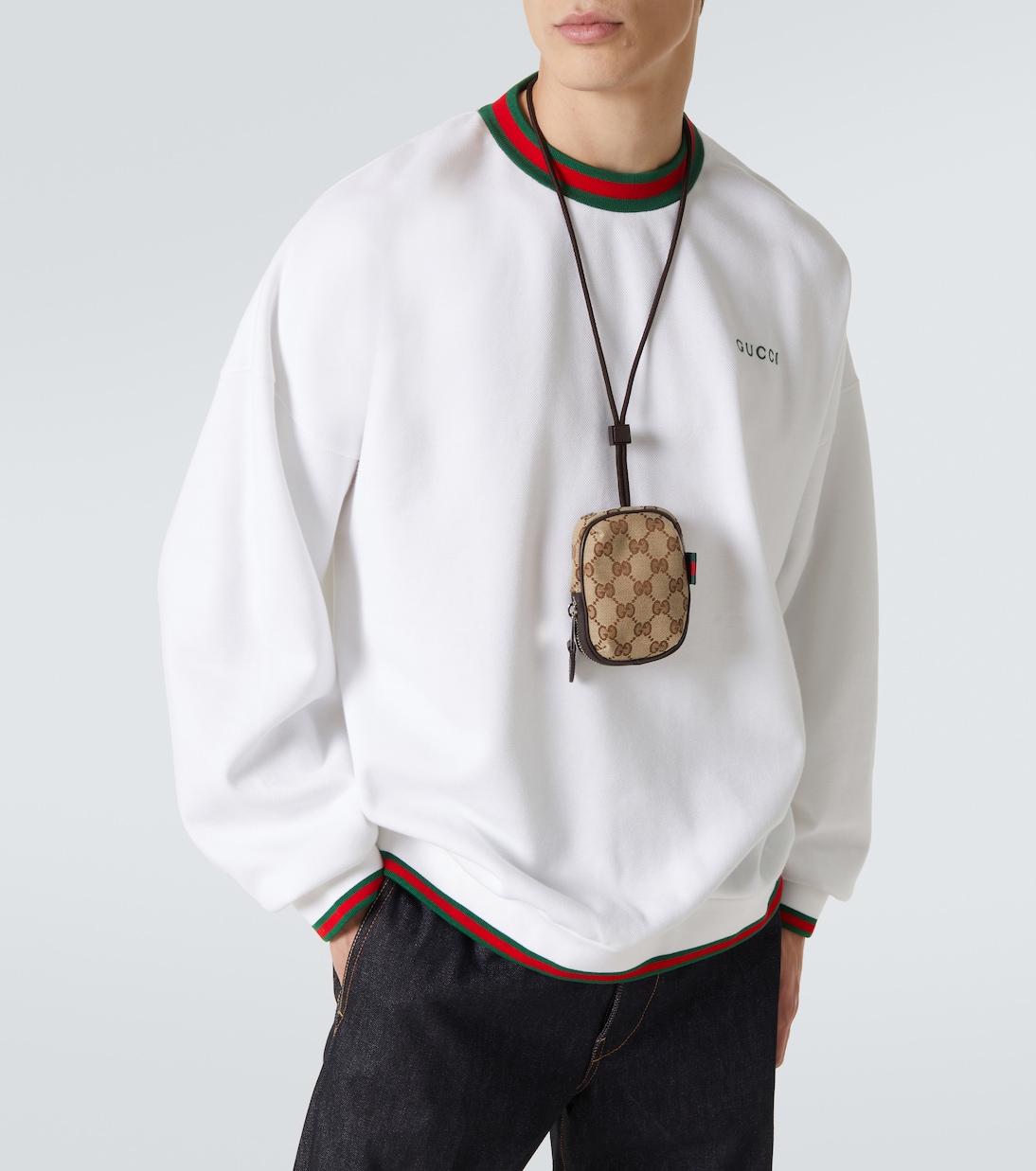 Bustina in canvas gg con tracolla | Gucci