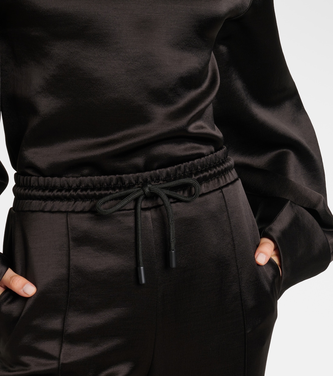 Pantaloni flared in raso a vita media | JW Anderson