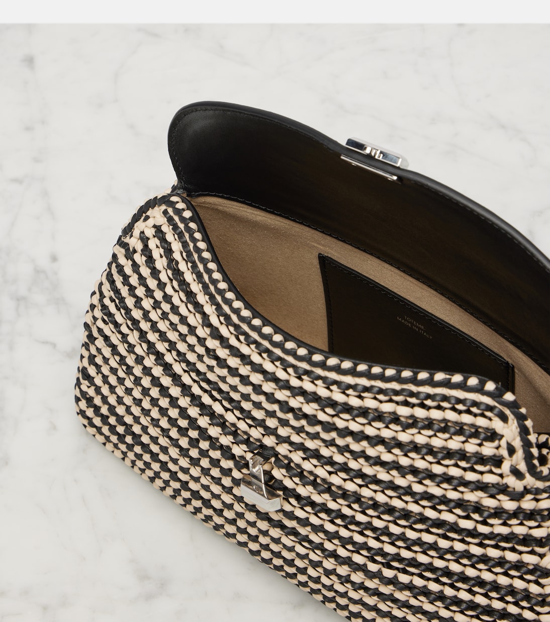 Clutch T-Lock Small de piel | Toteme
