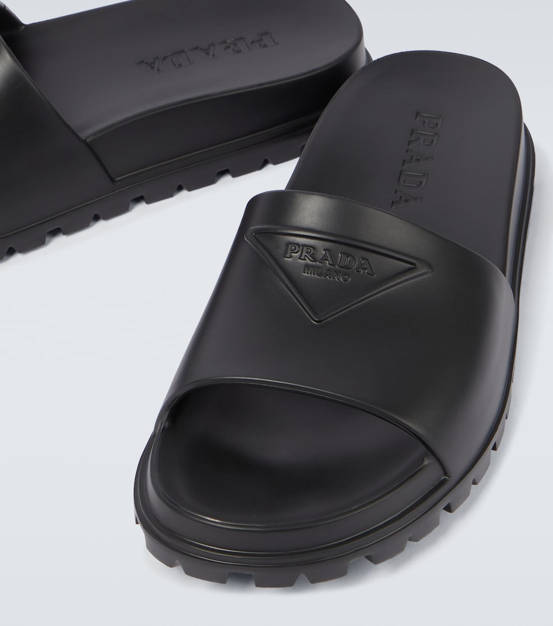 Logo rubber slides in black Prada Mytheresa