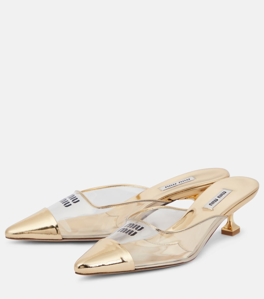 Mules in pelle e PVC con logo | Miu Miu
