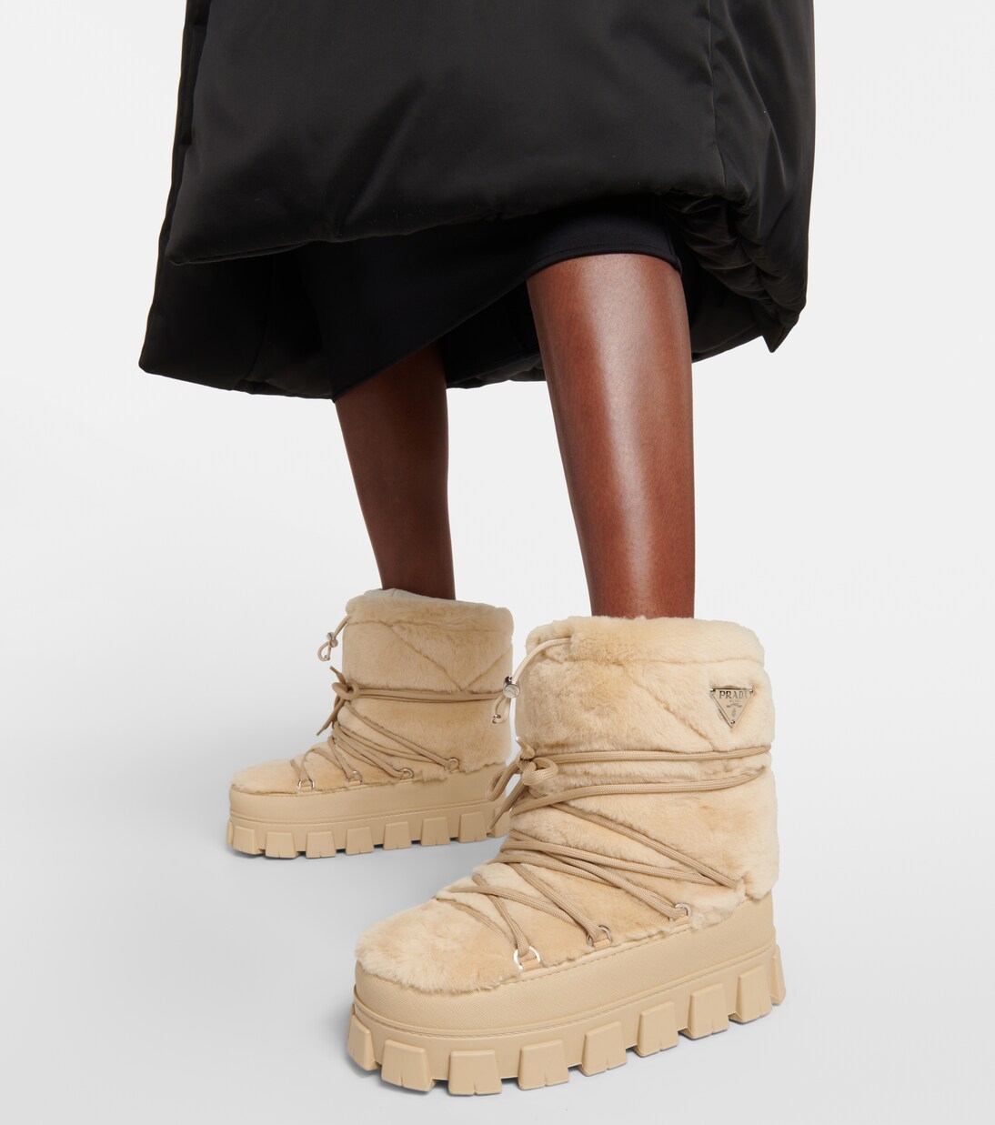 Shearling and leather snow boots | Prada