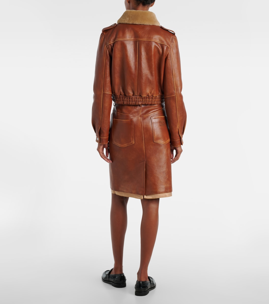 Shearling-trimmed leather jacket | Miu Miu