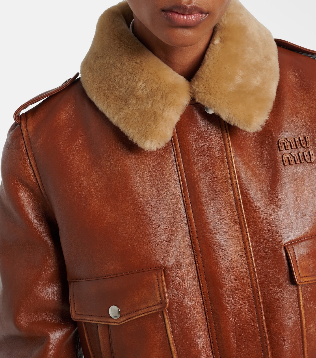 Shearling-trimmed leather jacket | Miu Miu