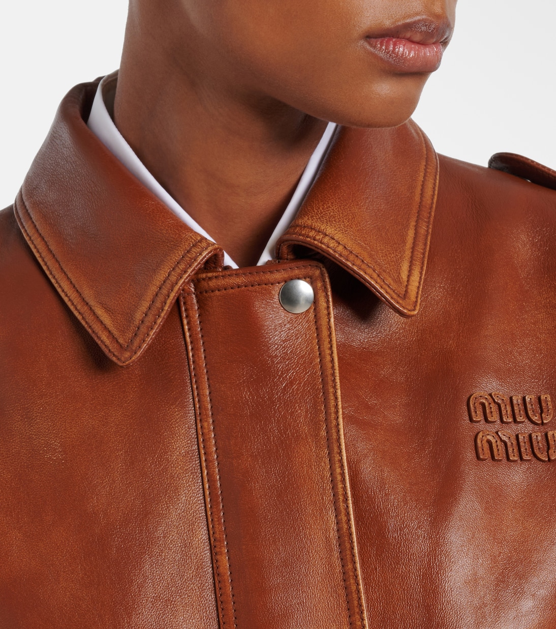 Shearling-trimmed leather jacket | Miu Miu