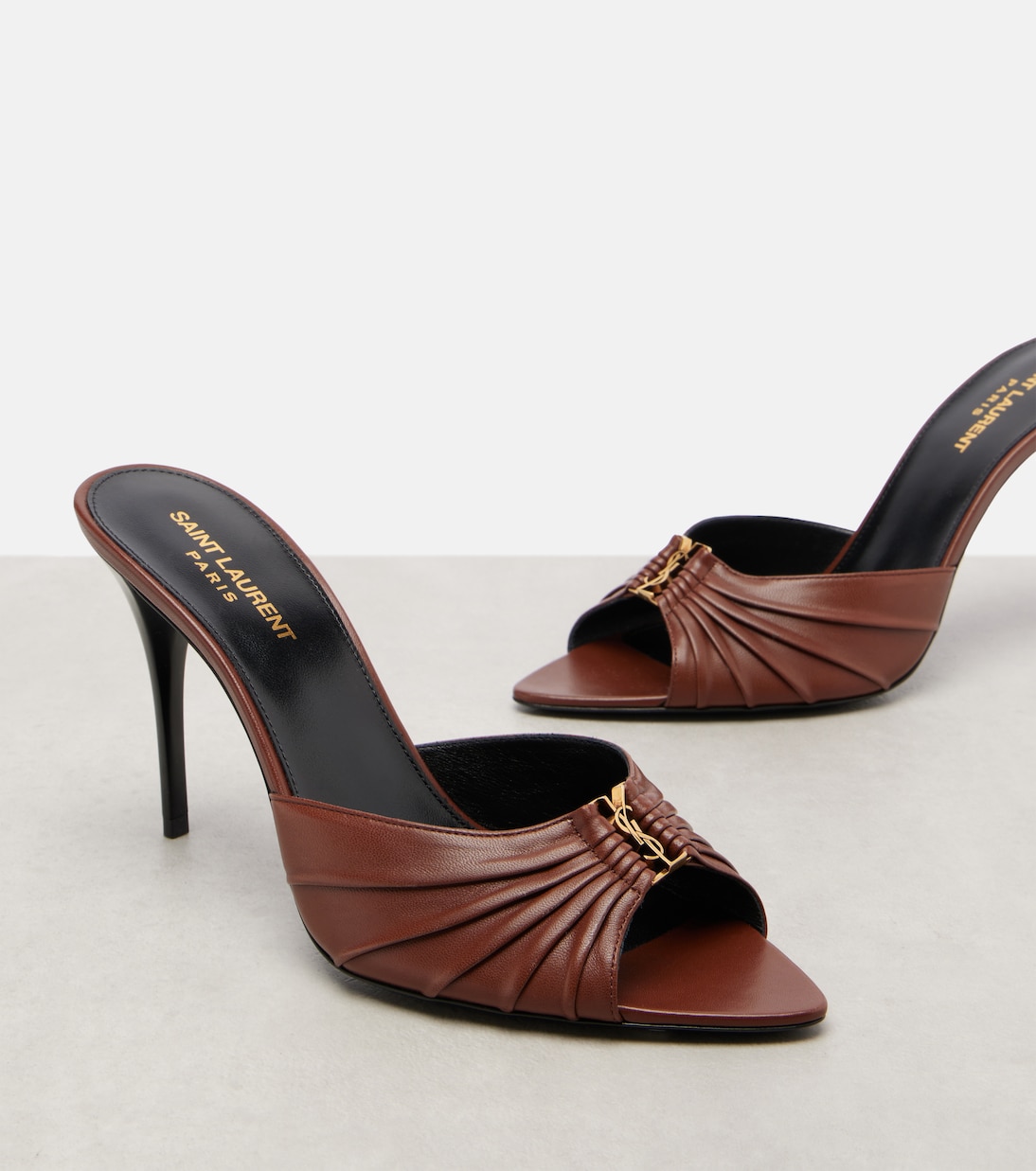 Babylone Cassandre 90 leather mules | Saint Laurent