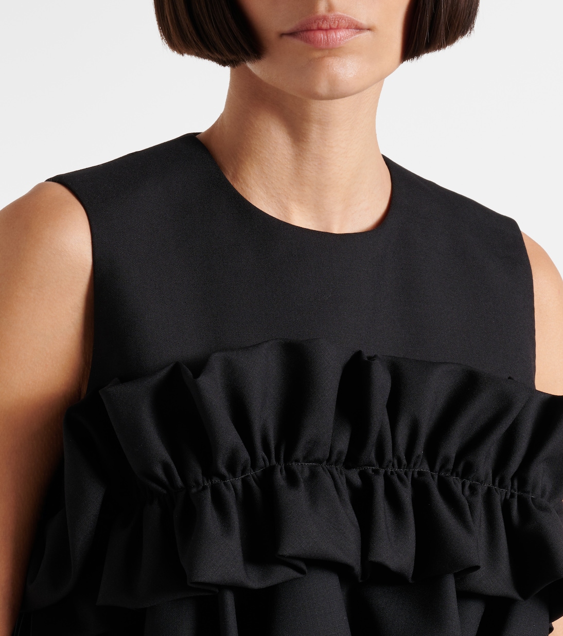 Ruffled wool top | Noir Kei Ninomiya