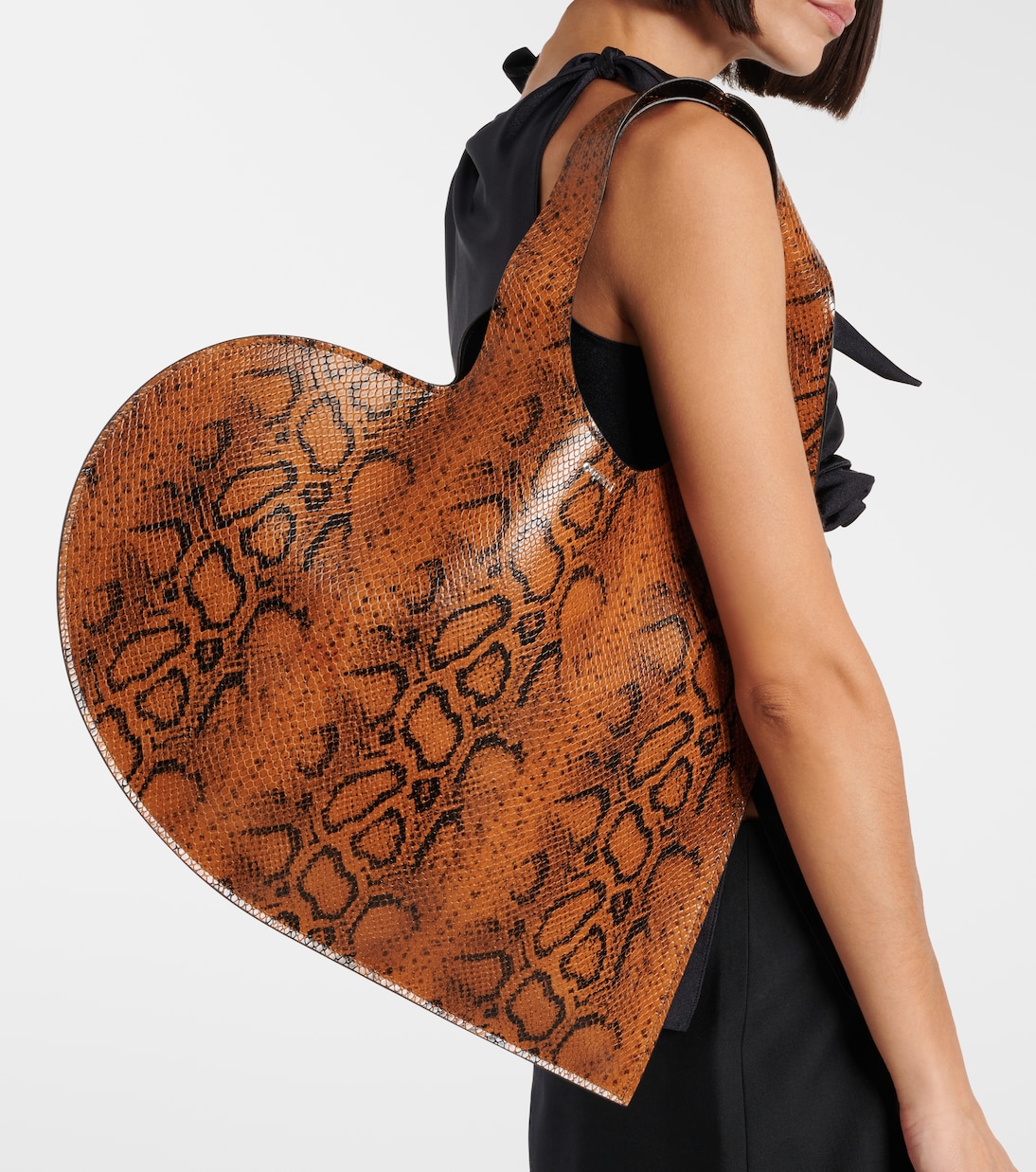 Borsa Heart in pelle con stampa serpente | Coperni