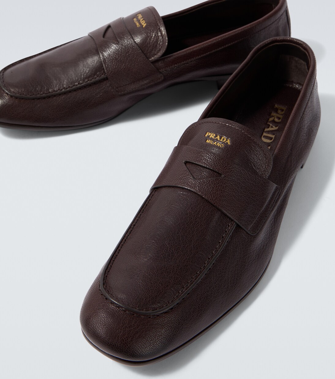 Logo leather penny loafers | Prada