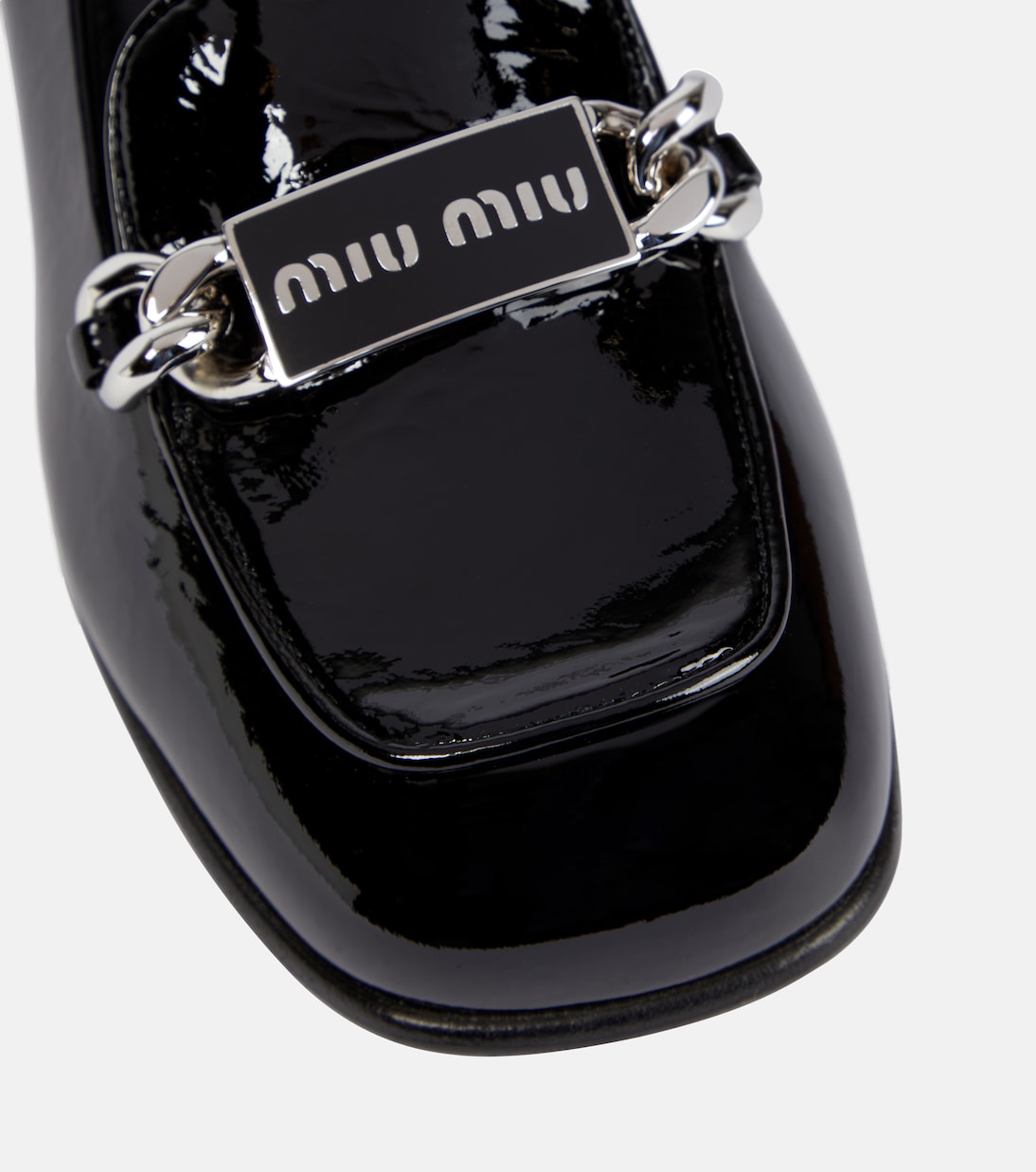 Mocassins en cuir verni à logo | Miu Miu
