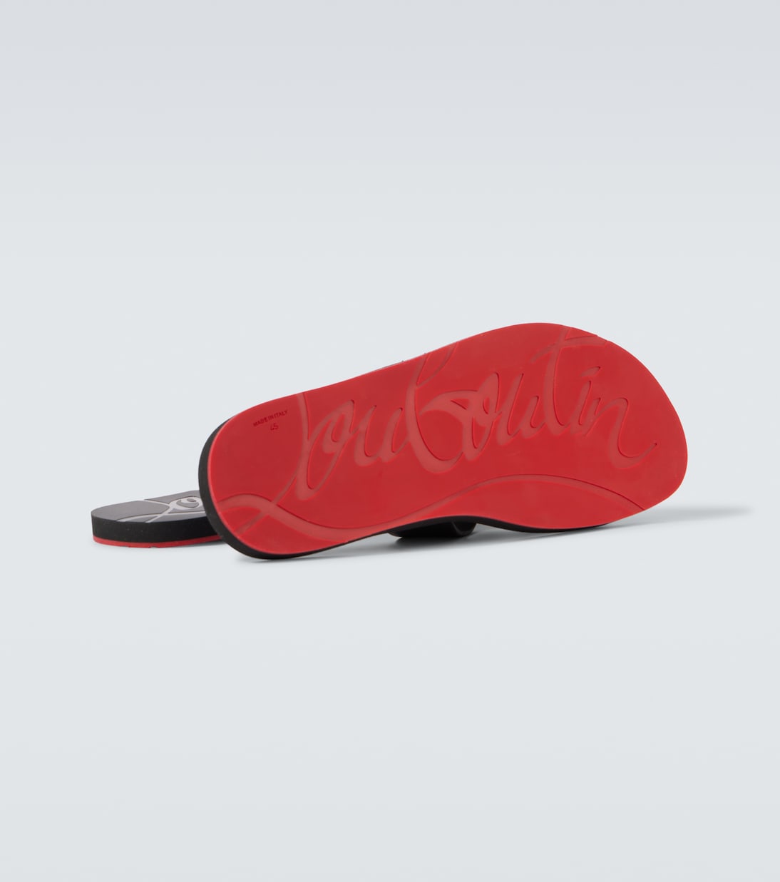 Loubi Cross rubber slides | Christian Louboutin