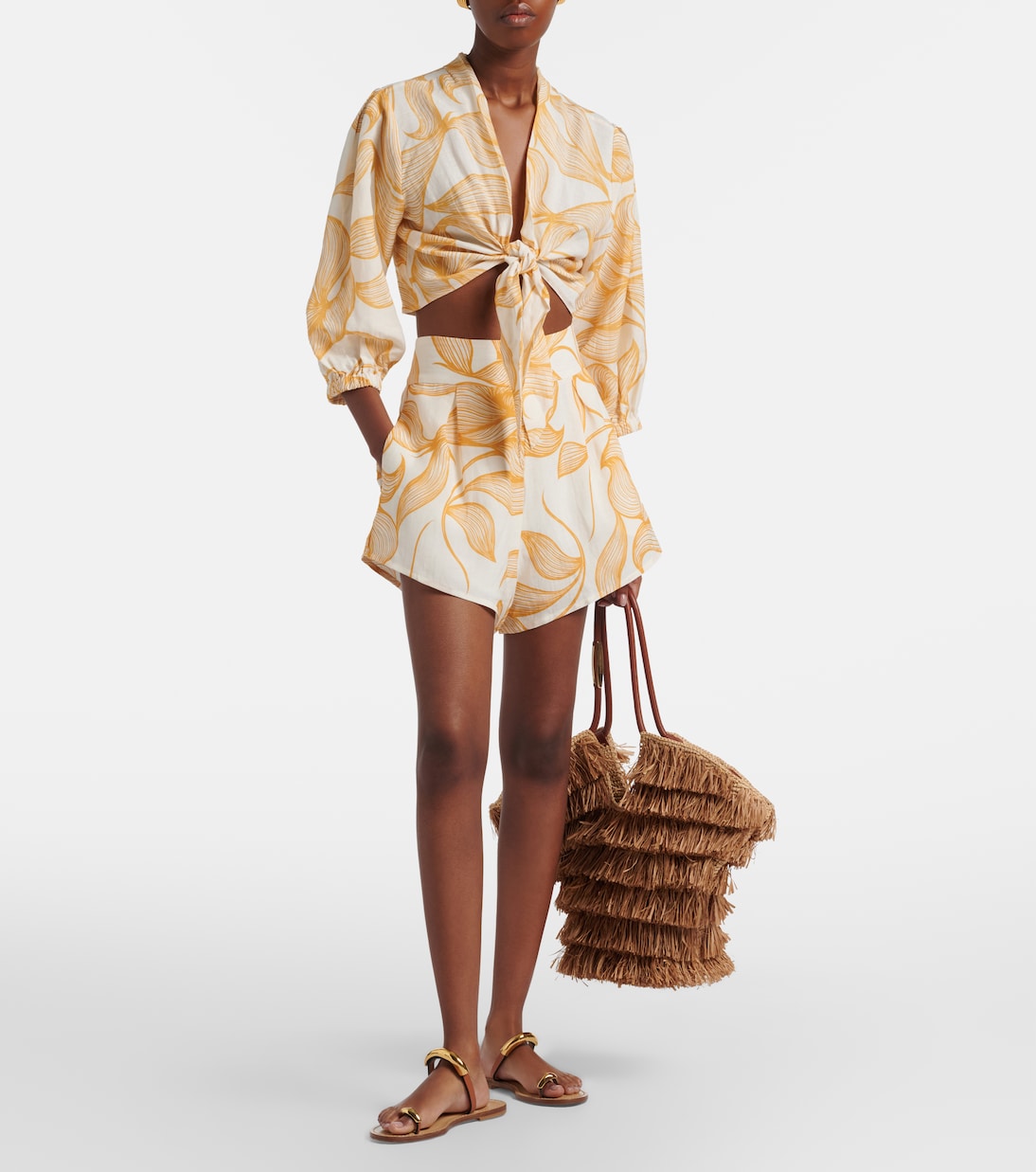 Shorts a gamba larga con stampa foliage | Adriana Degreas