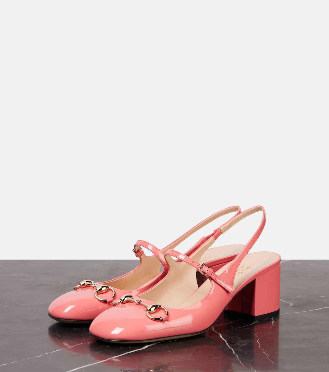 Horsebit patent leather slingback pumps | Gucci