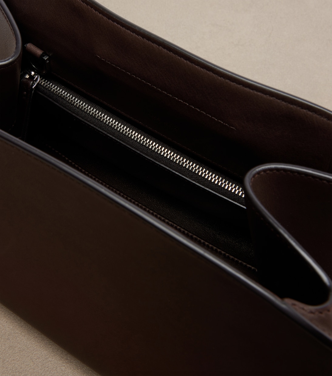 Peggy Small leather clutch | The Row