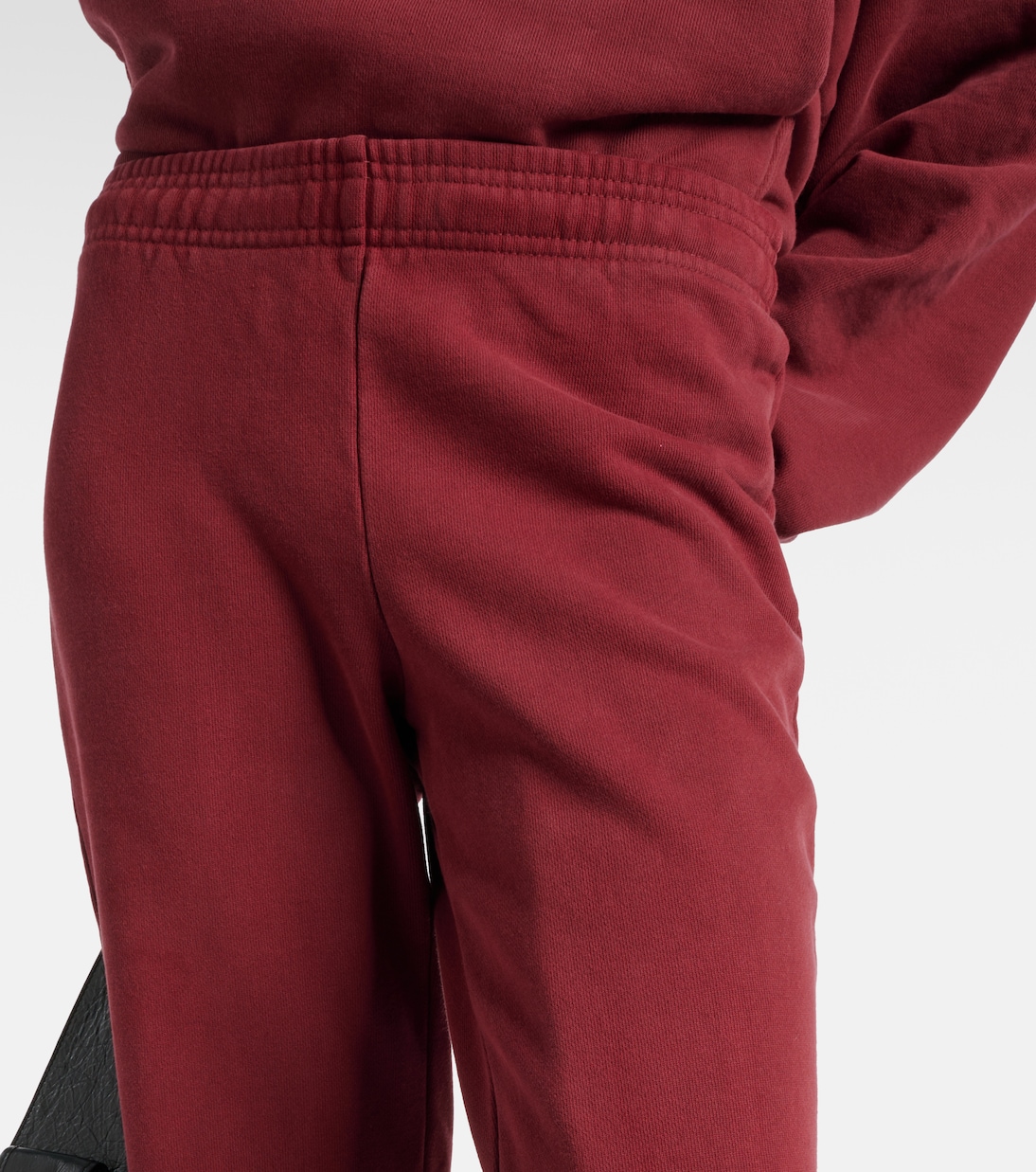 Pantalones flared de algodón | Entire Studios
