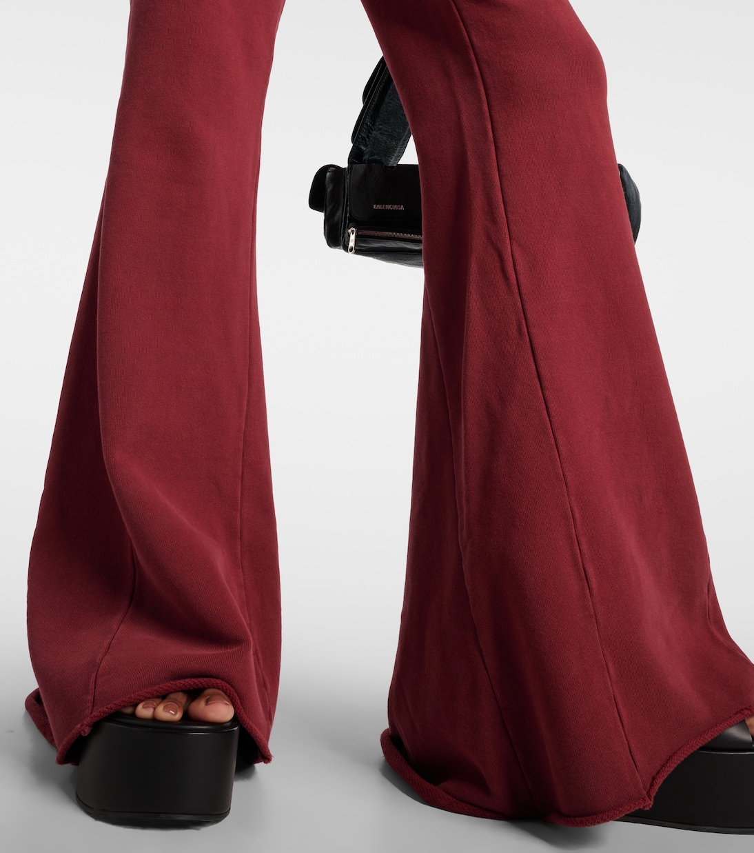 Pantalones flared de algodón | Entire Studios
