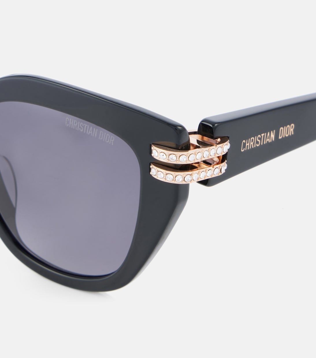 Occhiali da sole Dior B4I con dettagli a farfalla per uno stile giovane e audace