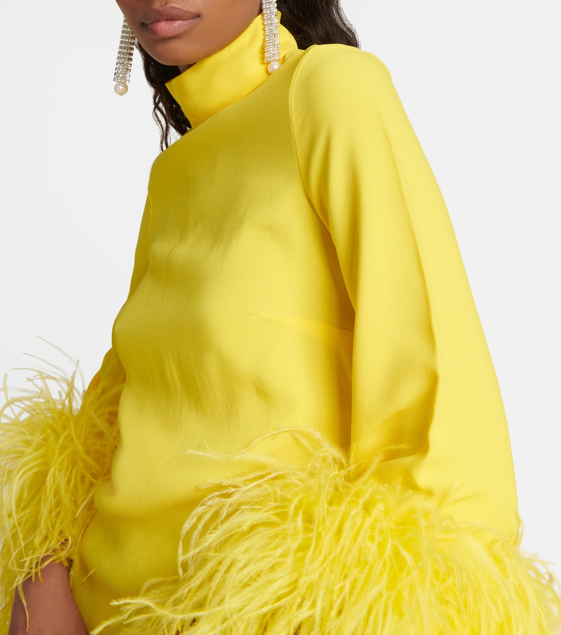 Yellow dress with feathers hotsell