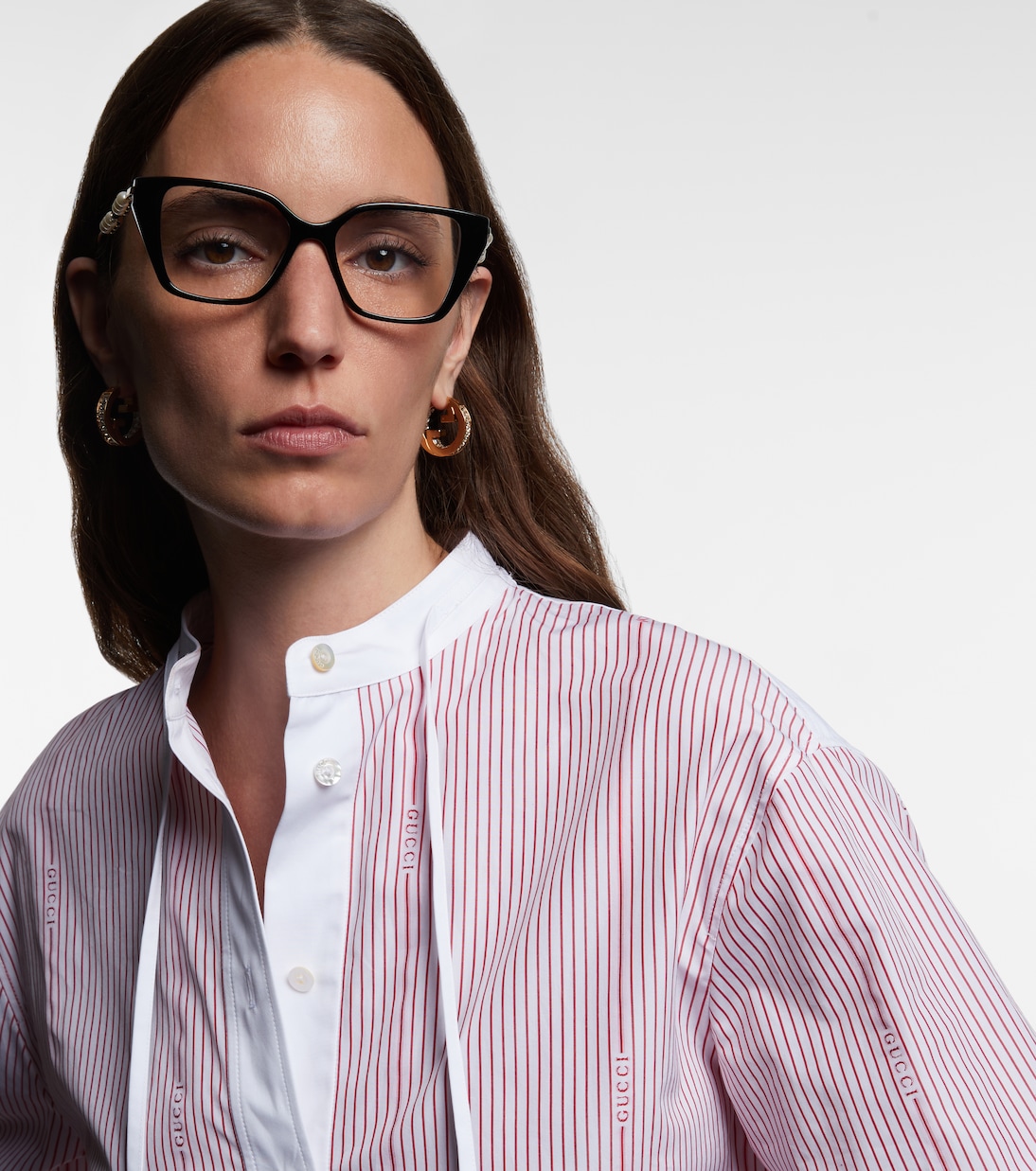 Occhiali cat-eye con logo Interlocking G | Gucci